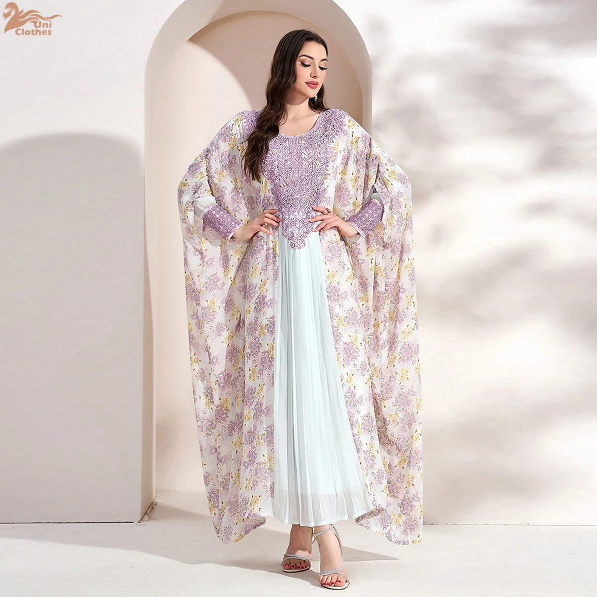 Uni Dubai فساتين أنيقة بأكمام تشبه جناح الخفّاش وم...