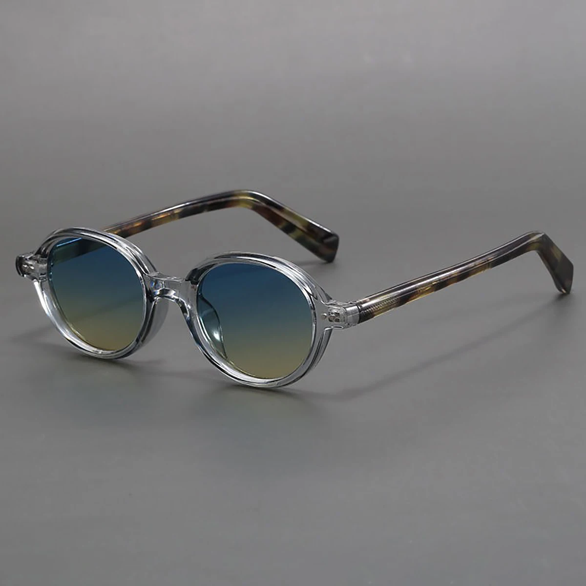 Vintage-Inspired Green Round Sunglasses with Leopard Print Accents and UV400 Protection