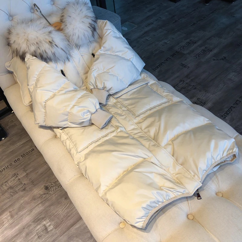 Рисунок 2 - Женский пуховик с воротником из меха енота