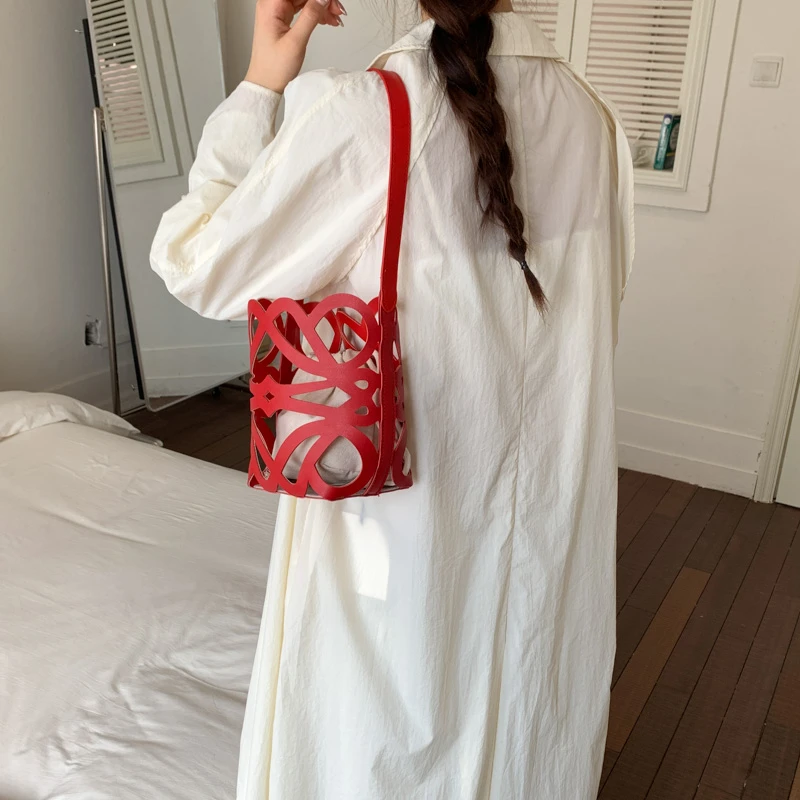 Nuova Borsa a Secchiello Estiva in PU Intrecciato con Dettagli Traforati, Borsa a Spalla Casual di Tendenza per Donna, Borsa a Mano da Spiaggia con Design Elegante - immagine 2