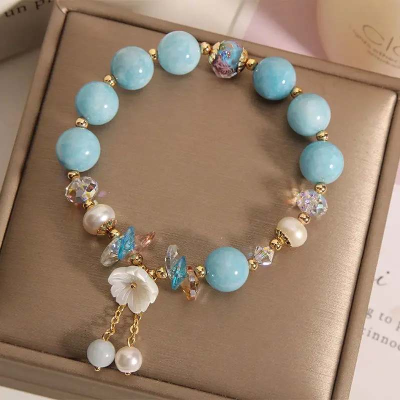 

Aquamarine Crystal Bracelet Women's Ins Niche Design Shell Flower Tassel To Make Money And Good Luck Best Friend Hand String