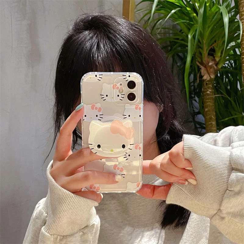 thumbnail image 1 of Sanrio-funda de Hello Kitty con soporte 3D para iPhone, 15, 14, 13, 11, 12 Pro Max, Mini, XS, XR, 7, 8 Plus, SE2, cubierta transparente a prueba de golpes, Y2K, 1 of 4