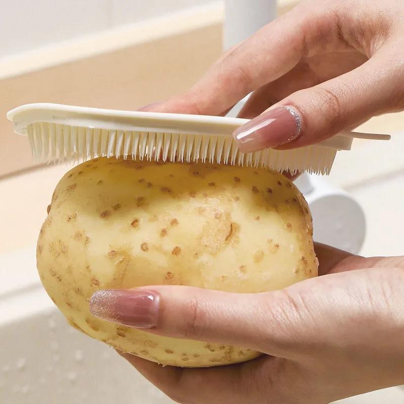 https://ae01.alicdn.com/kf/S73ae4126c9da40c293a255266f6402d8Q/Flexible-Vegetable-and-Fruit-Cleaning-Brush-for-Efficient-Cleaning-of-Potatoes-and-Carrots.jpg