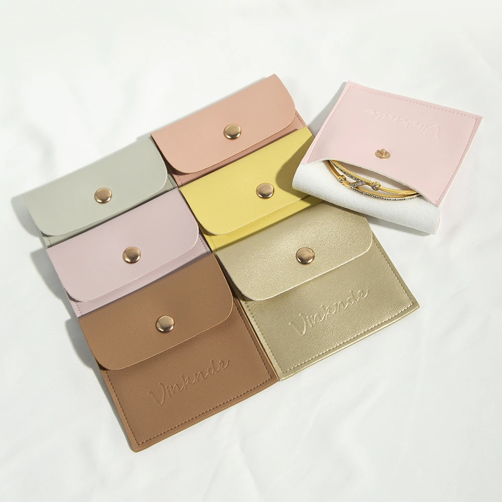 

PU Leather Jewelry Pouch With Debossed Logo Envelope Jewelry Earrings Packaging Button Snap Flat Bag Jewellery Pouches Custom