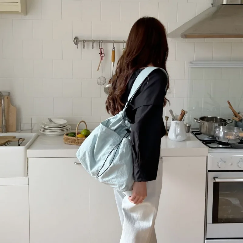 Korean nylon fabric casual drawstring, lazy and versatile oversized capacity single shoulder diagonal cross bag for women