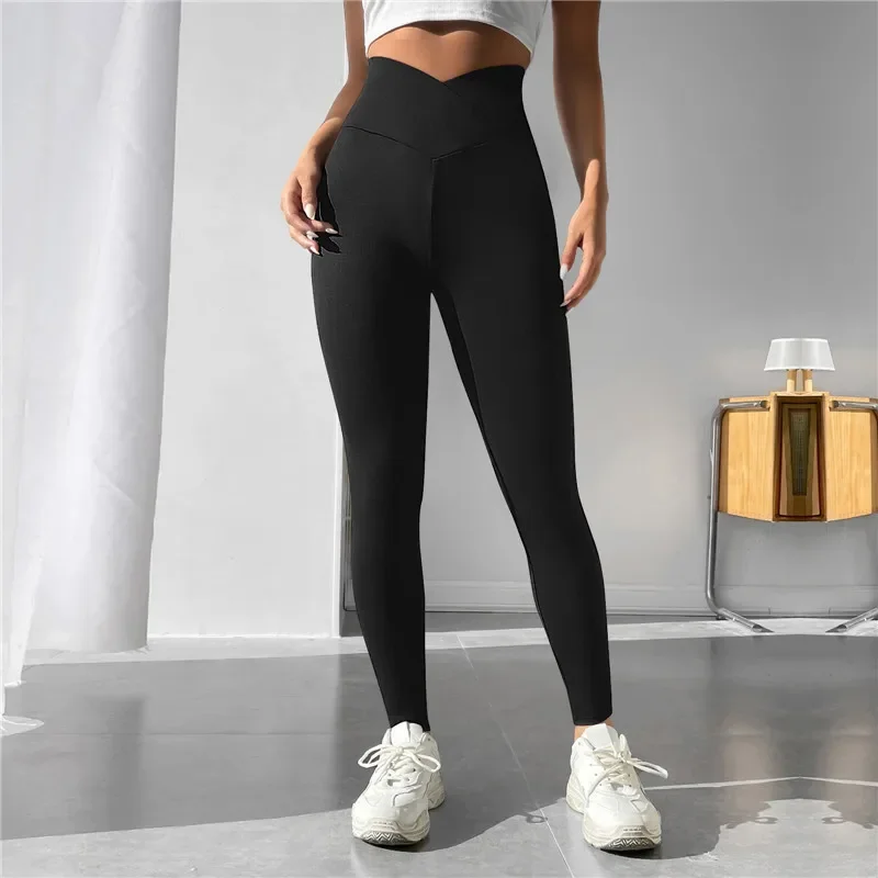 Pantalones de yoga con cabeza de cintura cruzada