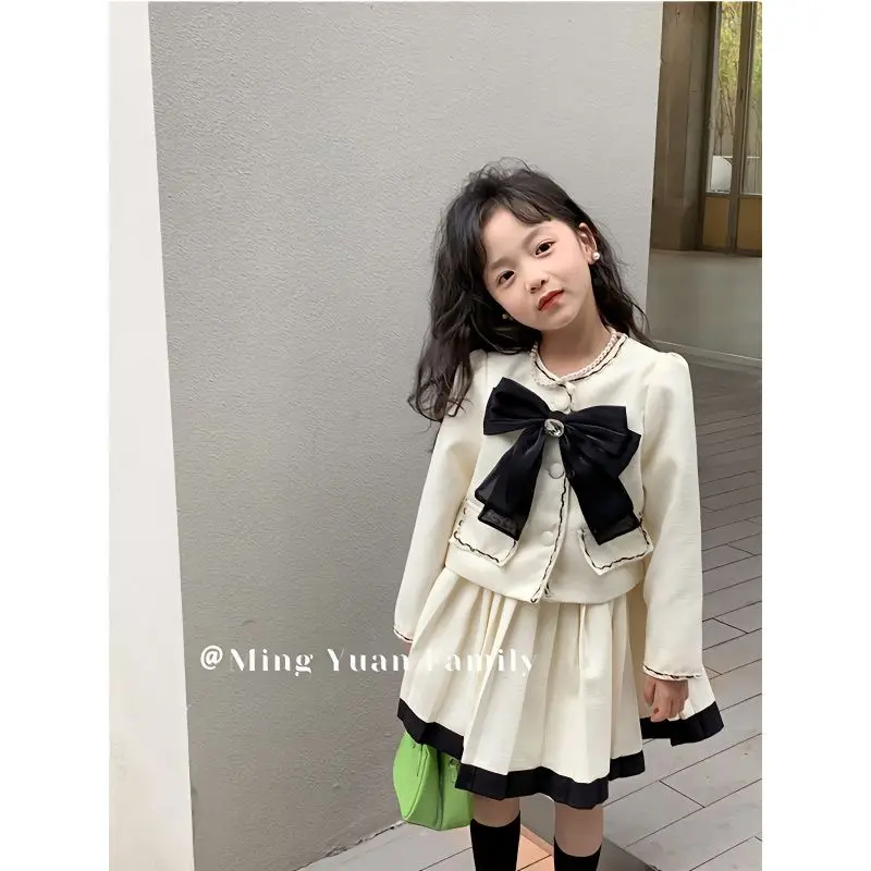 

Two Pieces Fashion Autumn Baby Girls Clothes White Bowknot Decorated Single Breasted Coats Cardigans Black Border Pleated Skirts