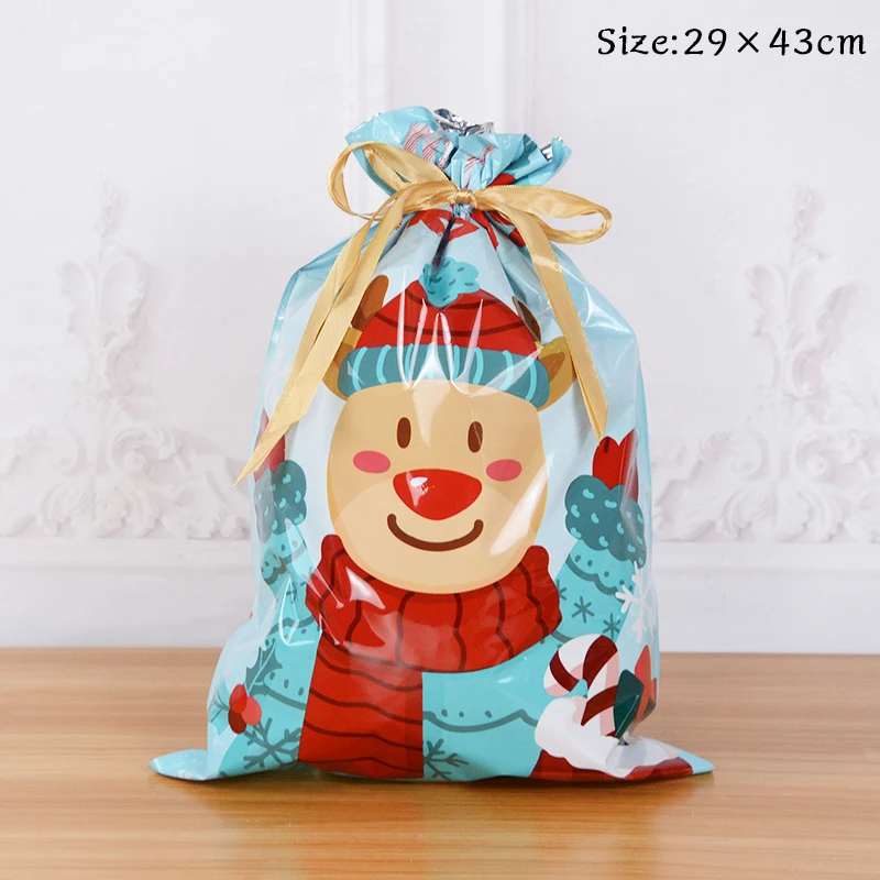thumbnail image 1 of Bolsas de regalo navideñas con cordón de 42/31 cm, diseño de Papá Noel, grandes, doradas y plateadas, para galletas, dulces, para Navidad, 5 unidades, 1 of 5