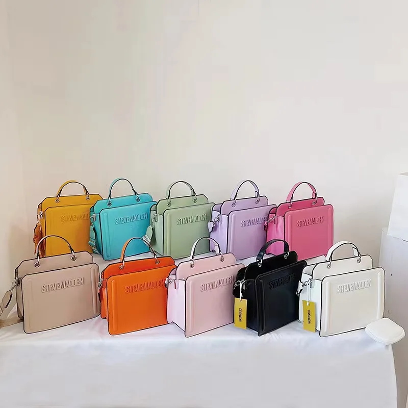 

2023 New Women's Handbag Stylish Fashion Simple PU Leather Luxury Design Popular Letter High quality Solid Color Shouder Bags