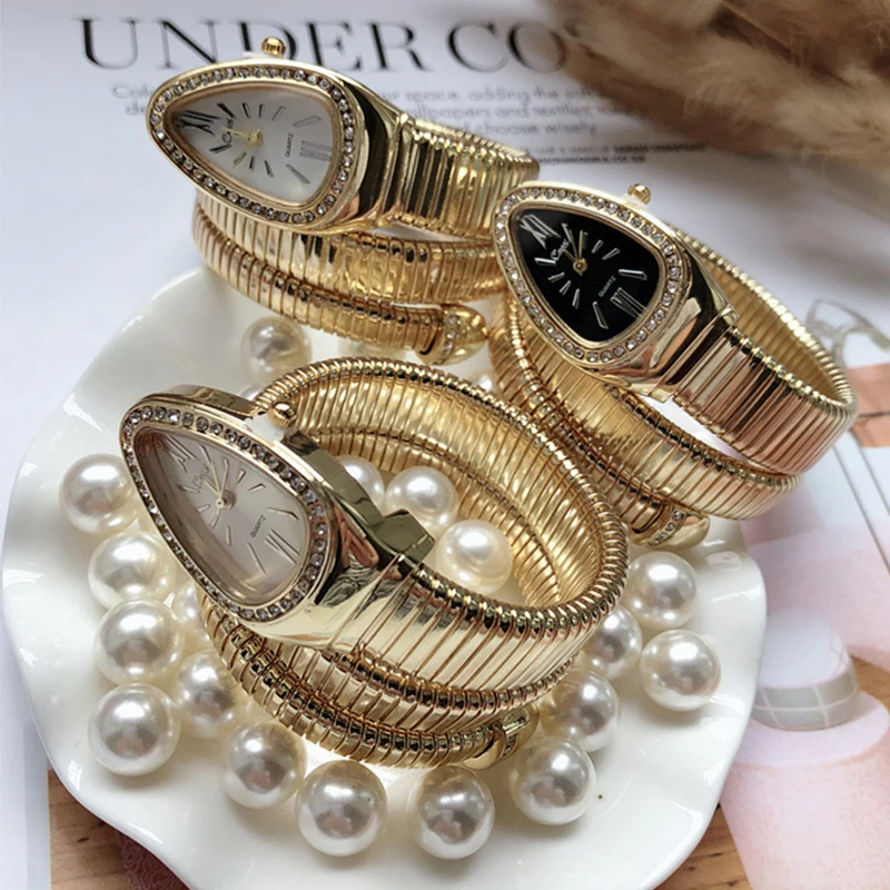 

Top Brand Mens Watches Luxury Snake Bracelets Clock Male Steel Strap Casual Quartz Watch Men Sports Wrist Watch