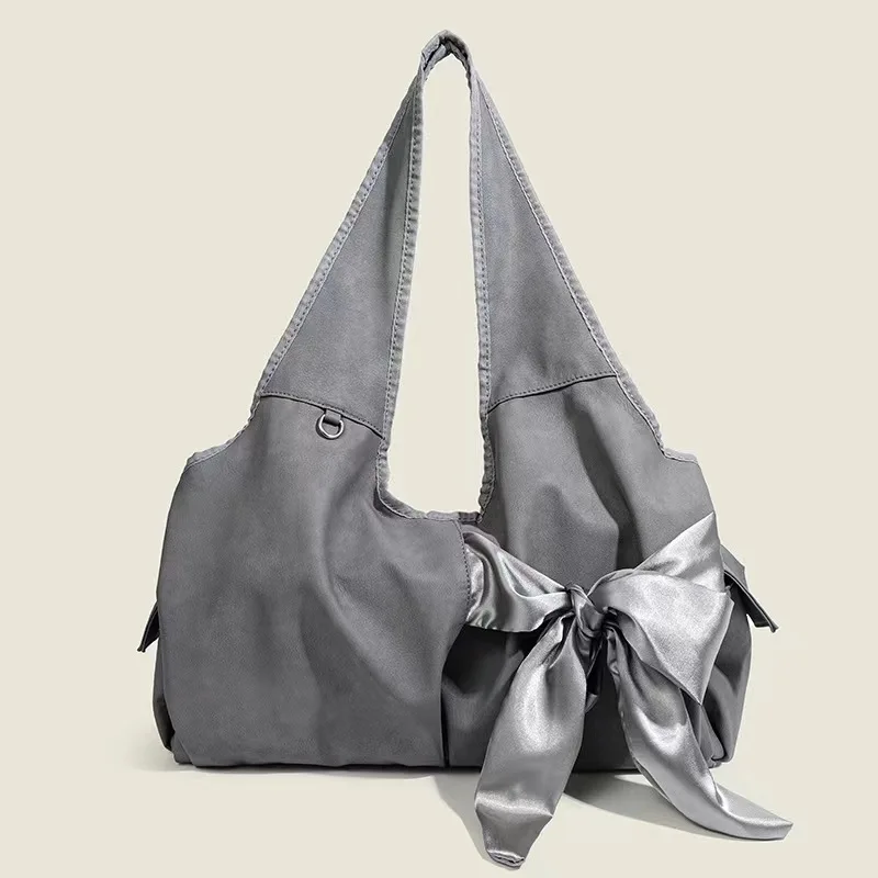 

New Niche Designer Luxury Retro Elegant Temperament Bow Bag Exquisite Versatile Armpit Bag High-end Casual Simple Shoulder Bag