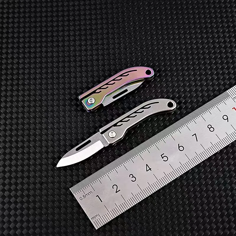 Titanium Alloy Mini Folding Knife Made of High Hardness Steel for Quick Opening, Portability, and Strong Practicality 3