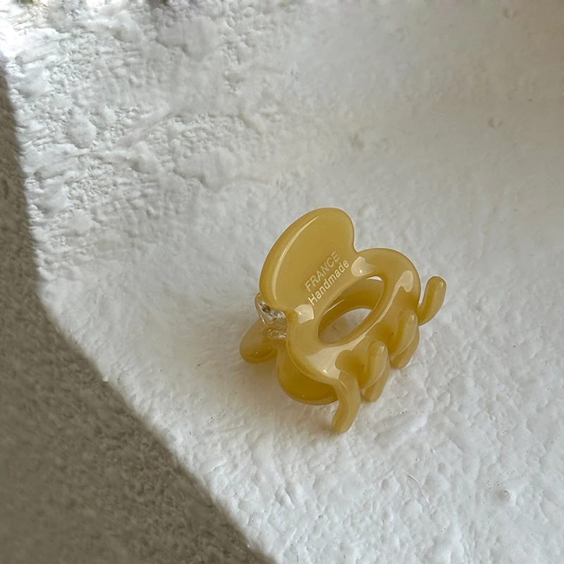 Exquisite Gold Label Mini Hair Claws - Stylish Elliptical Design