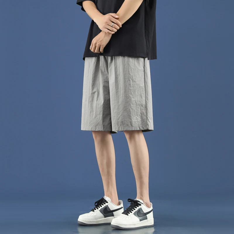 Fashion Elastic Solid Color Embroidery Straight Casual Shorts Men's Clothing 2024 Summer New Loose All-match Knee Beach Shorts