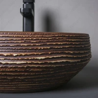 อ่างล้างจานเซรามิกทรงกลมสีน้ําเงินและสีน้ําตาลแกะสลักพื้นผิวอ่างล้างหน้าเหนือเคาน์เตอร์อ่างล้างหน้าอ่างล้างหน้าสําหรับระเบียงอพาร์ทเมนท์ 5