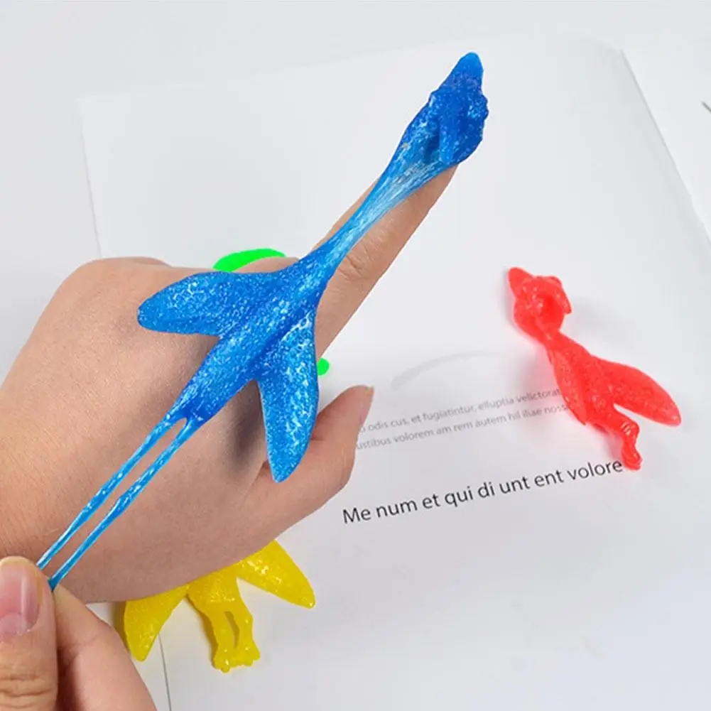 Slingshot Dinosaur Finger Adult Kids Toys Catapult Funny Shoting Flying  Sticky Games Party Favors Antistress Stretchy Toy - AliExpress