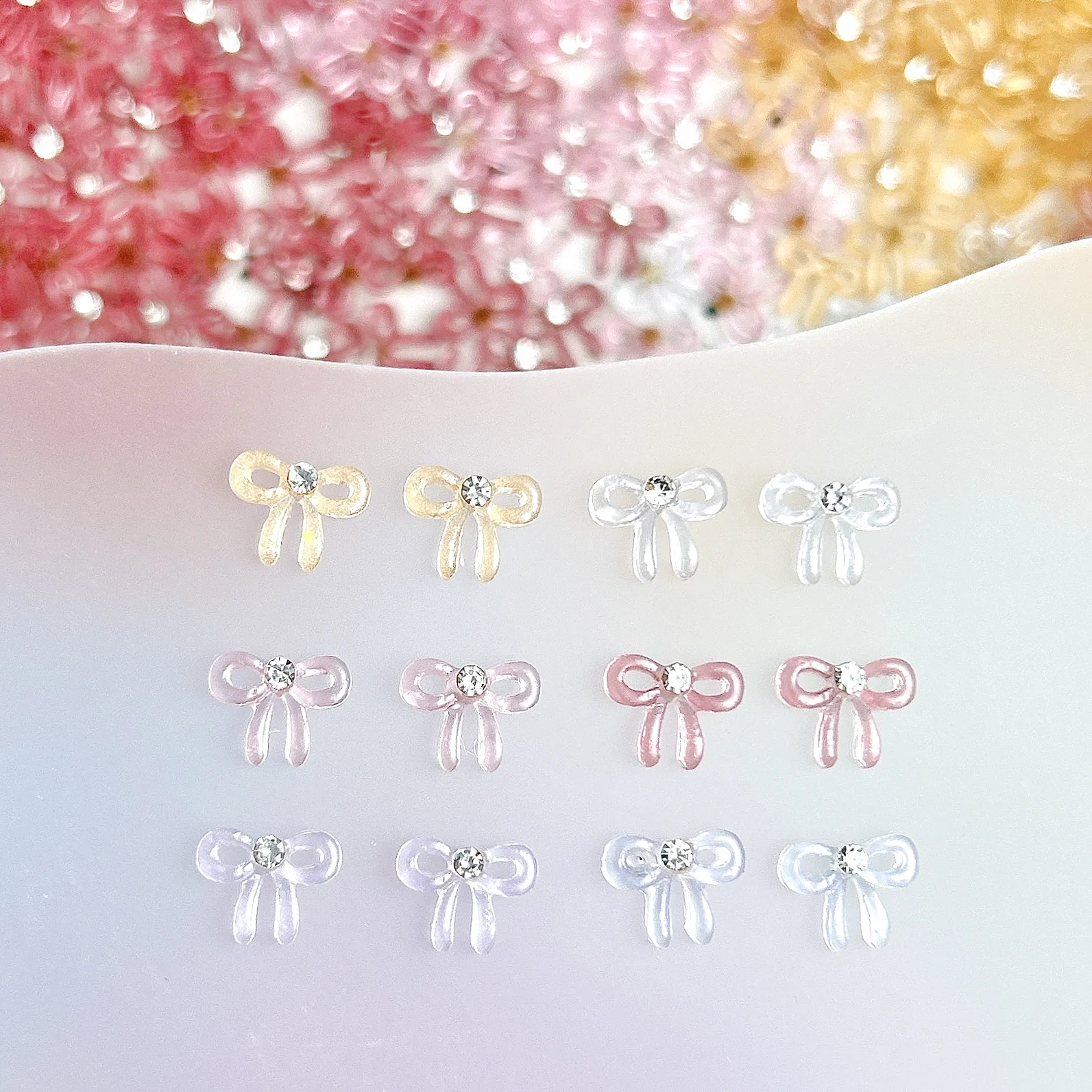 50PCS 솔리드 컬러 미니멀리스트 활 네일 매력 반투명 젤리 Bowknots DIY에 대한 미니 라인 석 상감 네일 아트 장식