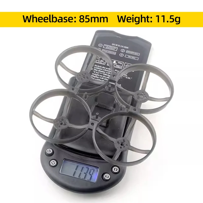 Cadre Happymodel Mobula8 85mm pour micro FPV whoop posé à plat, avec vis et accessoires.