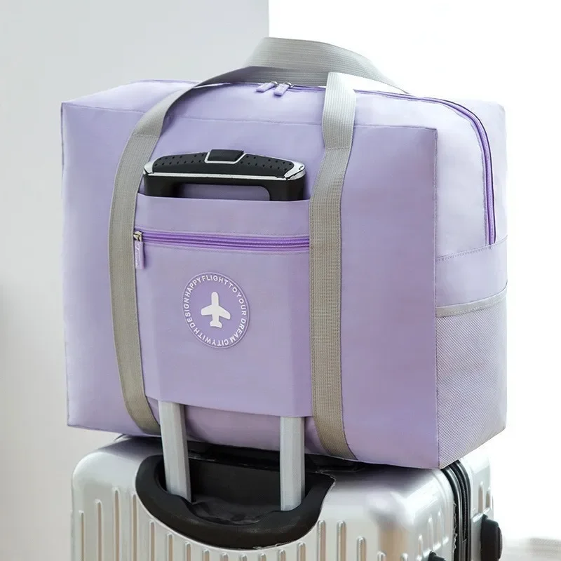thumbnail image 1 of Bolsa de viaje con etiqueta redonda y gran capacidad para tirar de la mano, bolsa de viaje portátil para almacenamiento, bolsa de viaje para deportes y fitness, 1 of 5