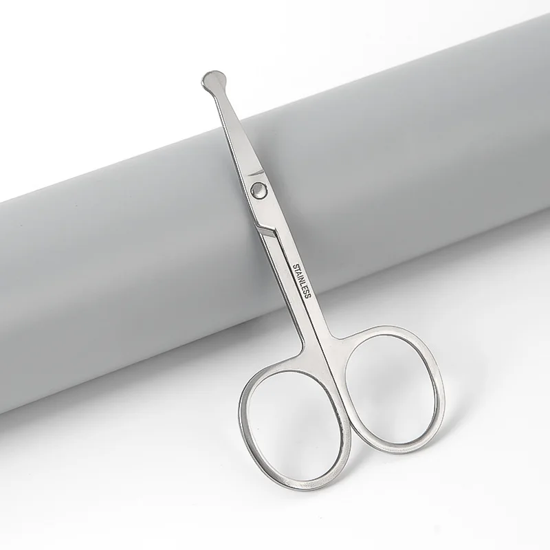Stainless steel eyebrow scissors, tweezers with rounded tips to prevent pricking, nose hair trimmer