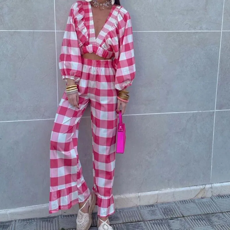 

Женский свитер с глубоким V-образным вырезом и рукавами-фонариками