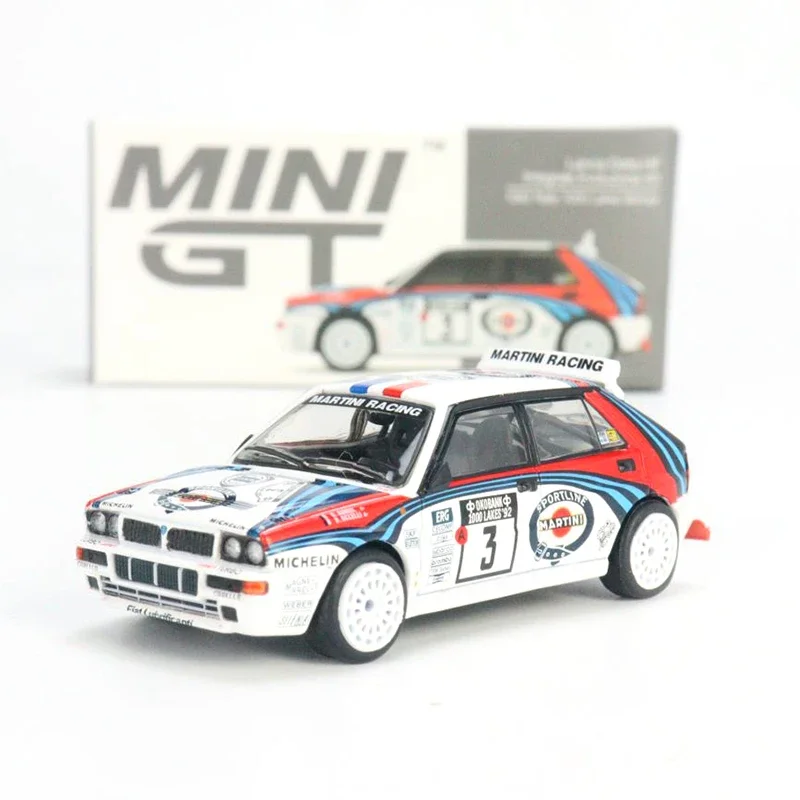 

MINI GT 64 Lancia Delta HF Integrale Evoluzione 1992 Rally 1000 Lakes Winner #3 LHD MGT00322-L Alloy Car Model Toy Racing Car