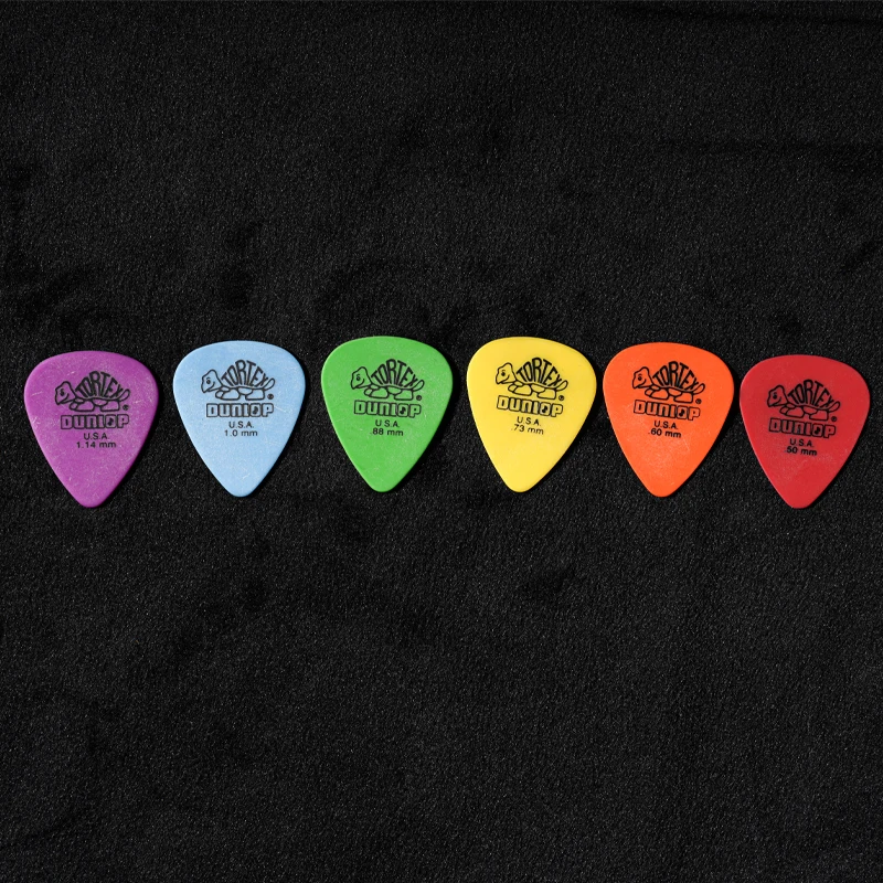 Description Picture 4 of itemDunlop  Pick. 418R STANDARD TORTEX material non-slip acoustic/electric guitar picks. Thickness: 0.50/0.60/0.73/0.88/1.00/1.14mm.