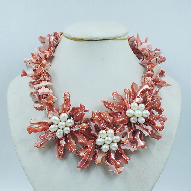 

Pink natural devil shell, pearl flower necklace 20"