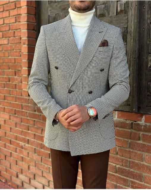 Man model in brown jacket, aqua shirt and blue trousers at white brick wall  Stock Photo | Adobe Stock