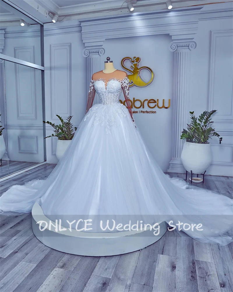 

Luxury Beading Long Sleeves Ball Gown Wedding Dress 2023 Gorgeous Sheer Neck Crystals Lace Appliques Bubai Princess Bridal Gown