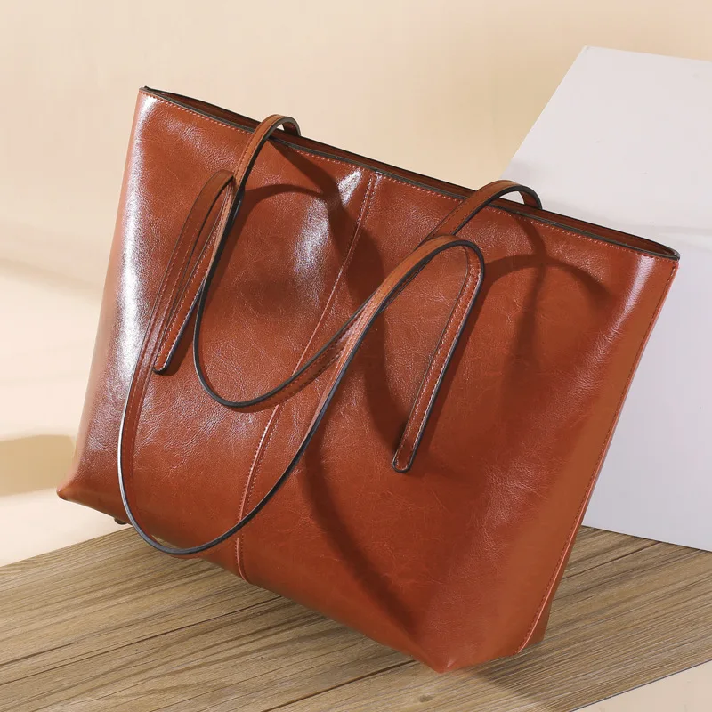 

Women's Large Capacity 2023 New iPad Genuine Leather Women's Bag Fashion Tote Bag Women's Portable Tablet Computer Bag One Shoul