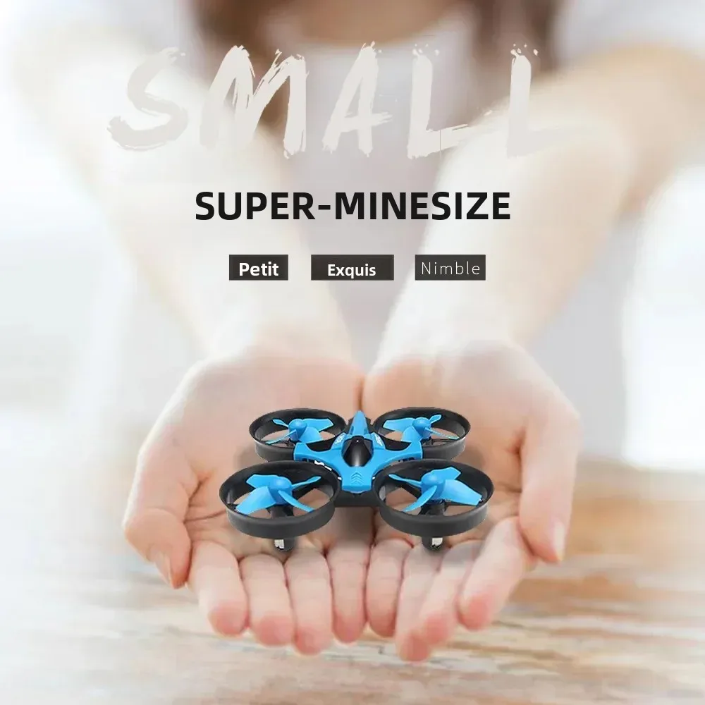 Le Mini Drone JJRC H36 avec Caméra HD 1080p - Drone RC Pas Cher pour Débutant en vol dans un parc, paysage flou en arrière-plan