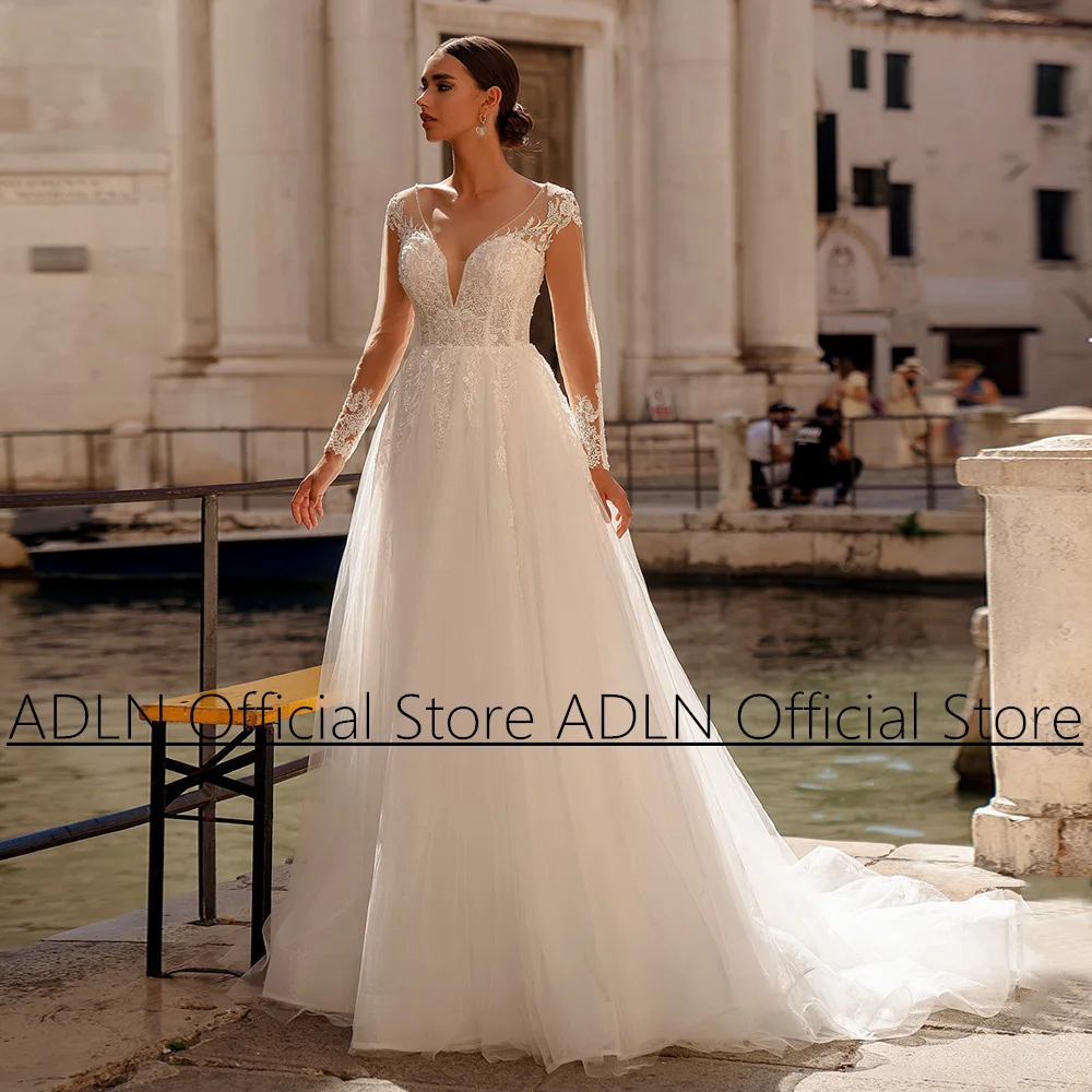 

Charming A-line Wedding Dress Sheer Long Sleeves V Neck See Through Backless Tulle Bride Dresses Custom Bridal Gown 2024