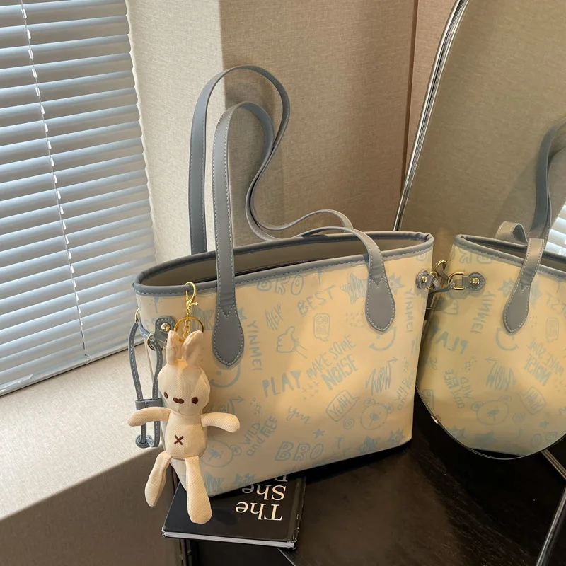 Tote Female Large Capacity Shoulder High Sense Big 2024 New Niche Graffiti Commuter Bag