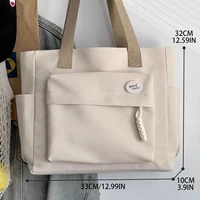 2025 mode sac à bandoulière pour femmes classe grande capacité étudiant fourre-tout nouveau toile sac à main de banlieue femmes sac Eco sac 3