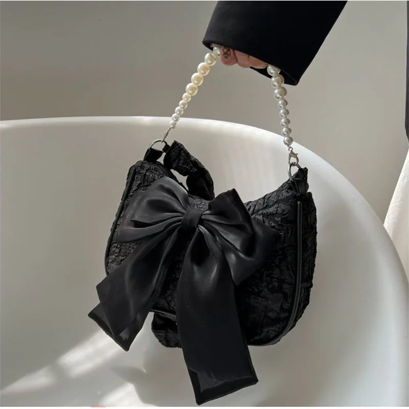 Fashion bow handheld pearl bag trend new crossbody small bag ladies shoulder