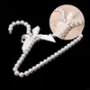Fashion Plastic Pearl Bow Clothes Clothing Hanger For Kids Children Pet Dog for 3