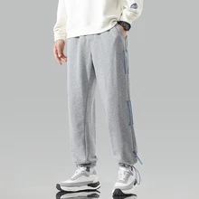 

Korean version of men's sports pants Spring and autumn trend casual 85 cotton tide new country dynasty couple loose hundred tape