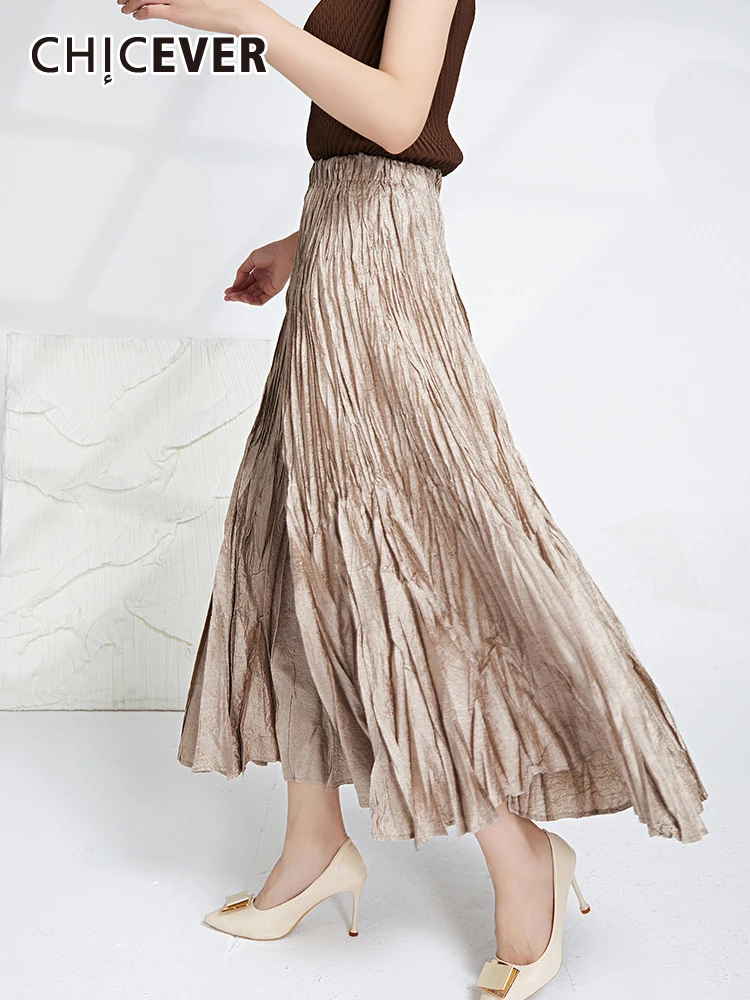

CHICEVER Temperament Midi Skirts For Women High Waist Loose Solid Korean Casual A Line Pleated Skirt Female Summer Clothing New
