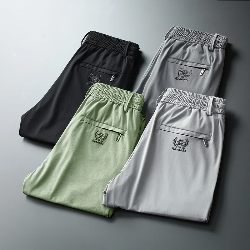 

2023 Men's Korea Summer Thin Casual Pants Breathable Ice Silk Soft Sports Zip Pocket Elastic Waist Jogging Work Trousers