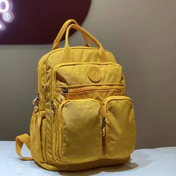 2023 Zaino da donna alla moda in nylon impermeabile con manico morbido Solido multi-tasca da viaggio con cerniera Borse da scuola femminili Zaino per laptop