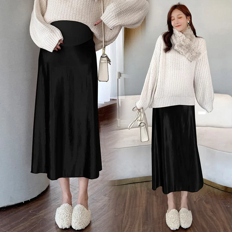 Korean style autumn pregnant women pleuche skirts abdomen long maternity fishtail skirt black umbrella skirt belly skirts