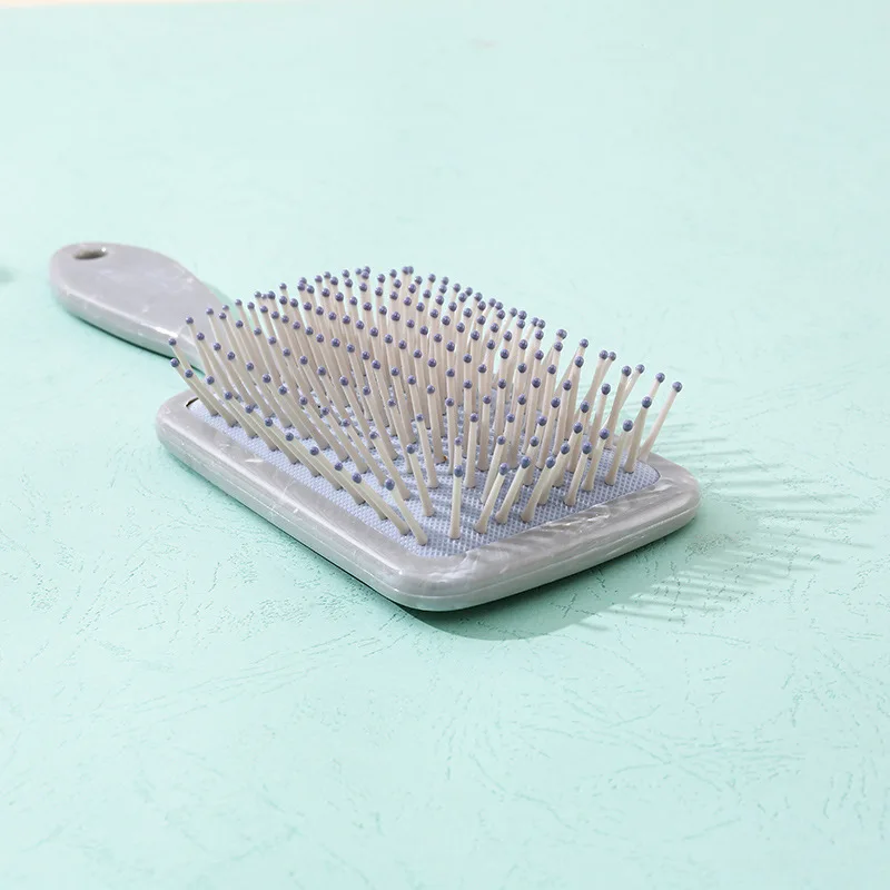 폭발적인 대리석 에어 쿠션 빗, 매듭 없는 부드러운 머리, 에어백 마사지 플라스틱 빗 스팟, 도매