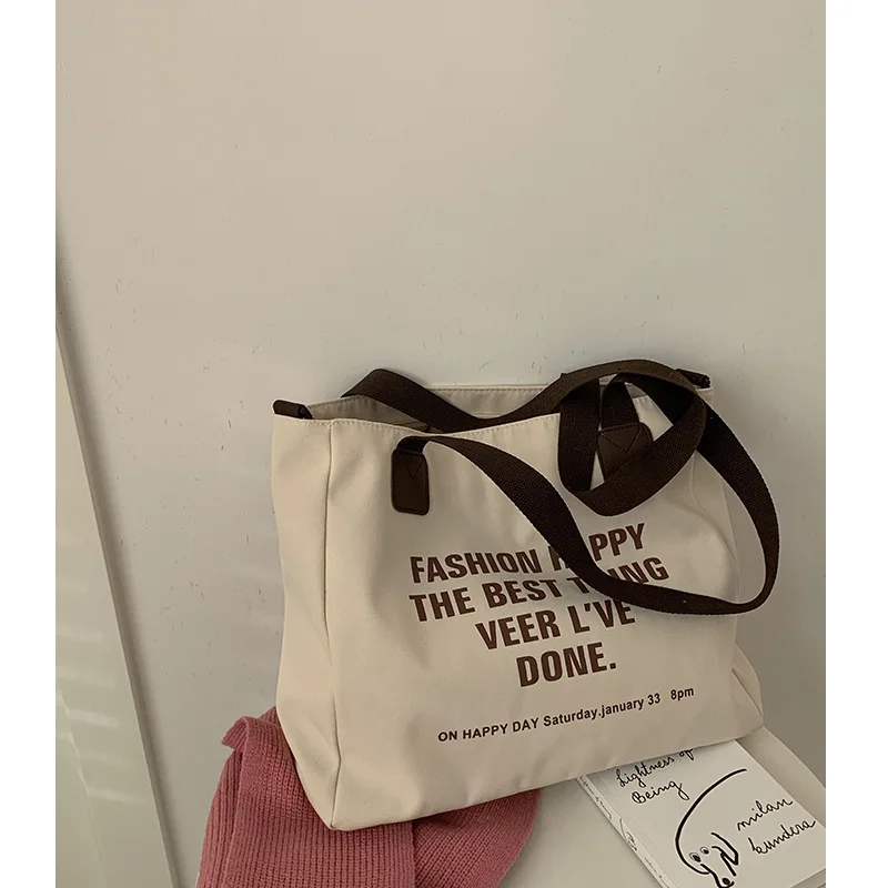 Korean Version of Large-capacity Canvas Bag Female 2022 New Fashion Letter Printing Tote Bag Joker Leisure Messenger Bag