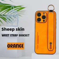 Luxurious Imitation Sheepskin Wrist Strap Phone Case with Stand Holder - Soft Silicone Shockproof Cover - iPhone 12 Pro (Orange)