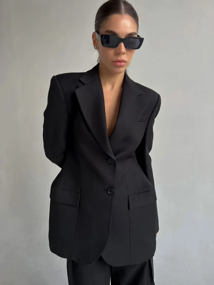Traje de solapa negra para mujer, abrigo elegante de manga larga con bolsillos y retazos, blazer de cintura alta para otoño 2025