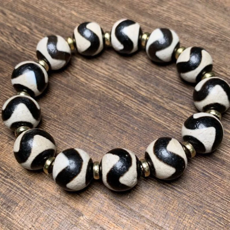 

Factory Wholesale Tibet High Oil Coated Pulp Weathering Tiger Tooth Tibet Beads Bracelet Bracelet One Piece Dropshipping