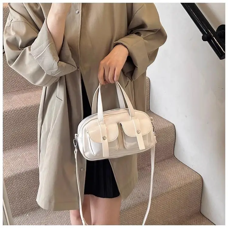 Bolso de mano de diseño retro francés de alta gama con múltiples bolsillos, sencillo y versátil, estilo de viaje, bandolera de un solo hombro, moderno