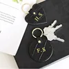 Wholesale free custom initial keychain metal ring embossed croco pattern genuine leather heart car leather keychains 1
