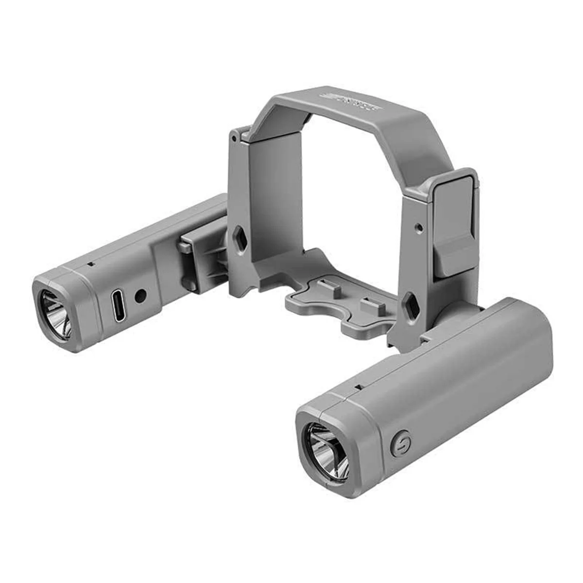 Projecteur LED double pour DJI Mini 4 Pro posé sur une table, montrant son boîtier noir et ses connecteurs, avec le drone à côté.